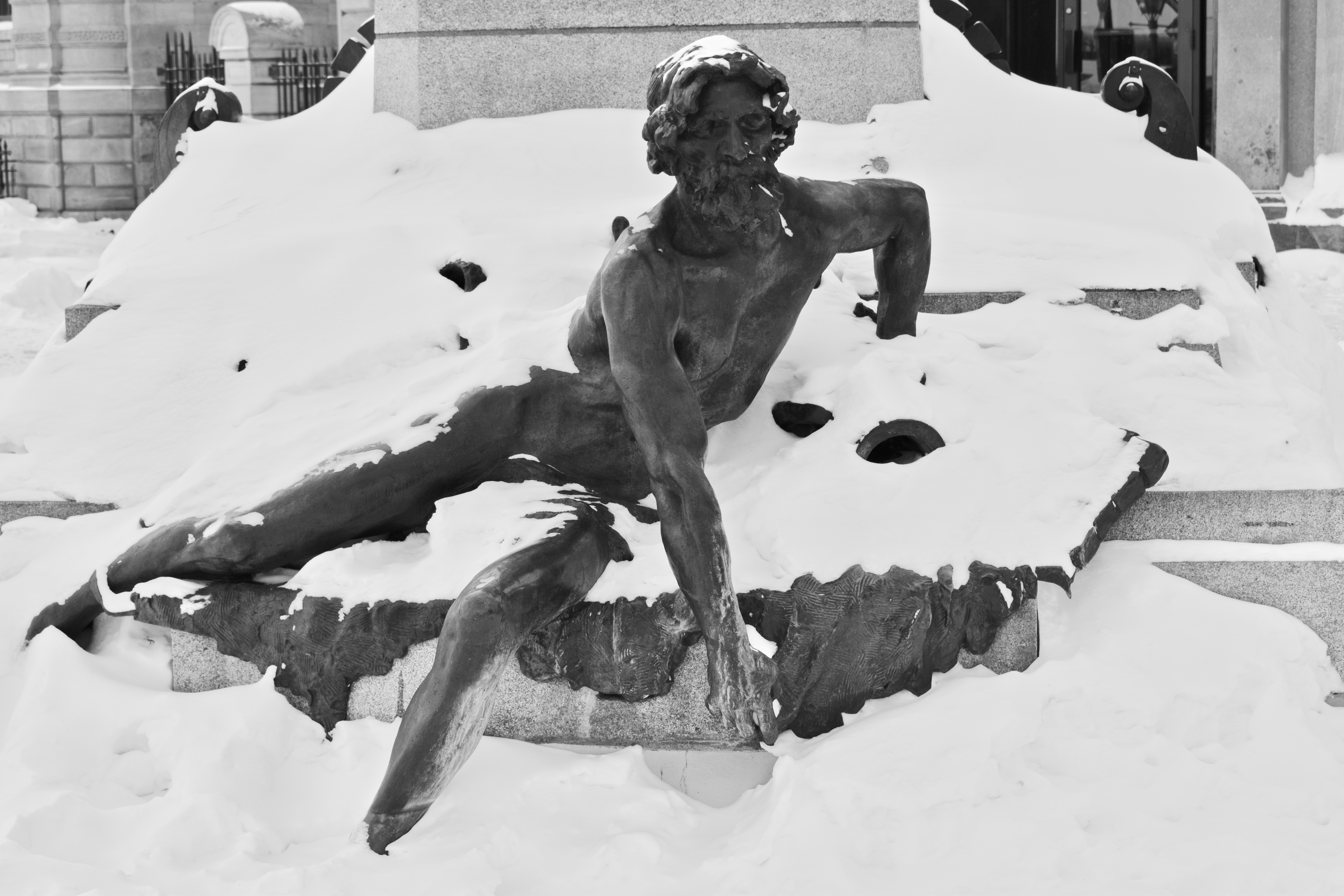 Sculpture in Old Montreal covered in snow. It's the weekend number 32