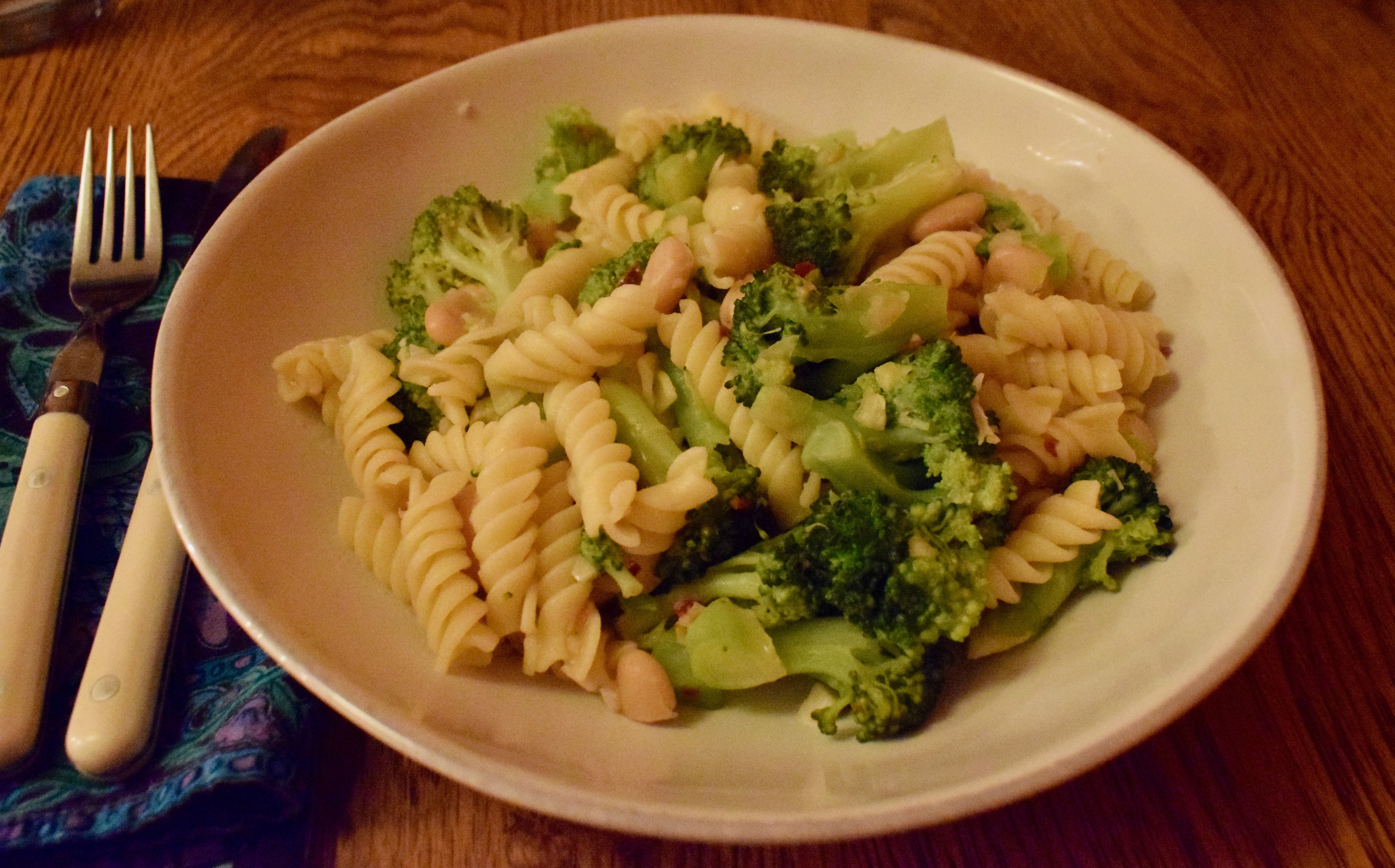 Place Setting with Spicy Broccoli and White Bean Pasta