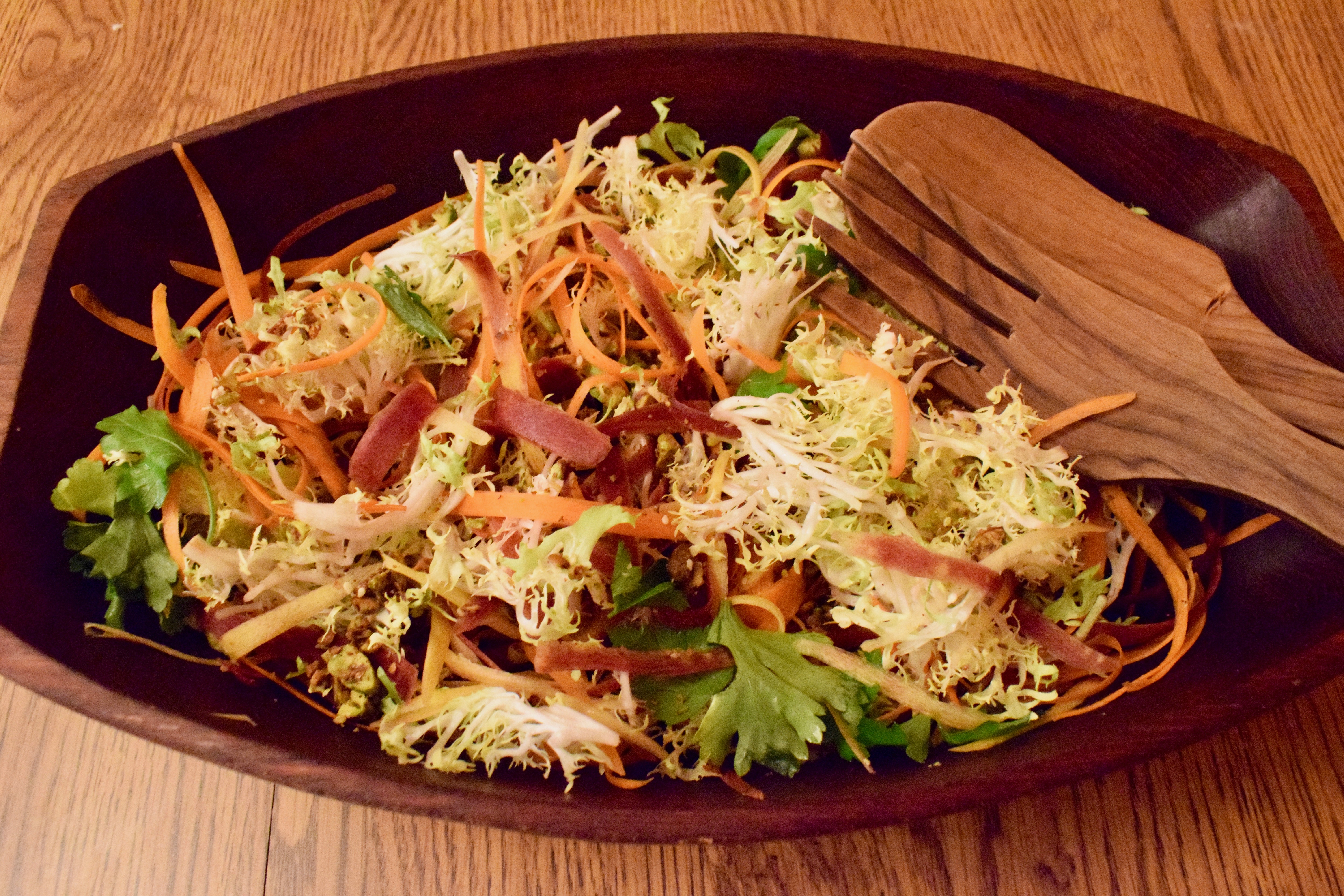 Frisée Carrot Salad with Lemon Za'atar Vinaigrette in Wooden Bowl
