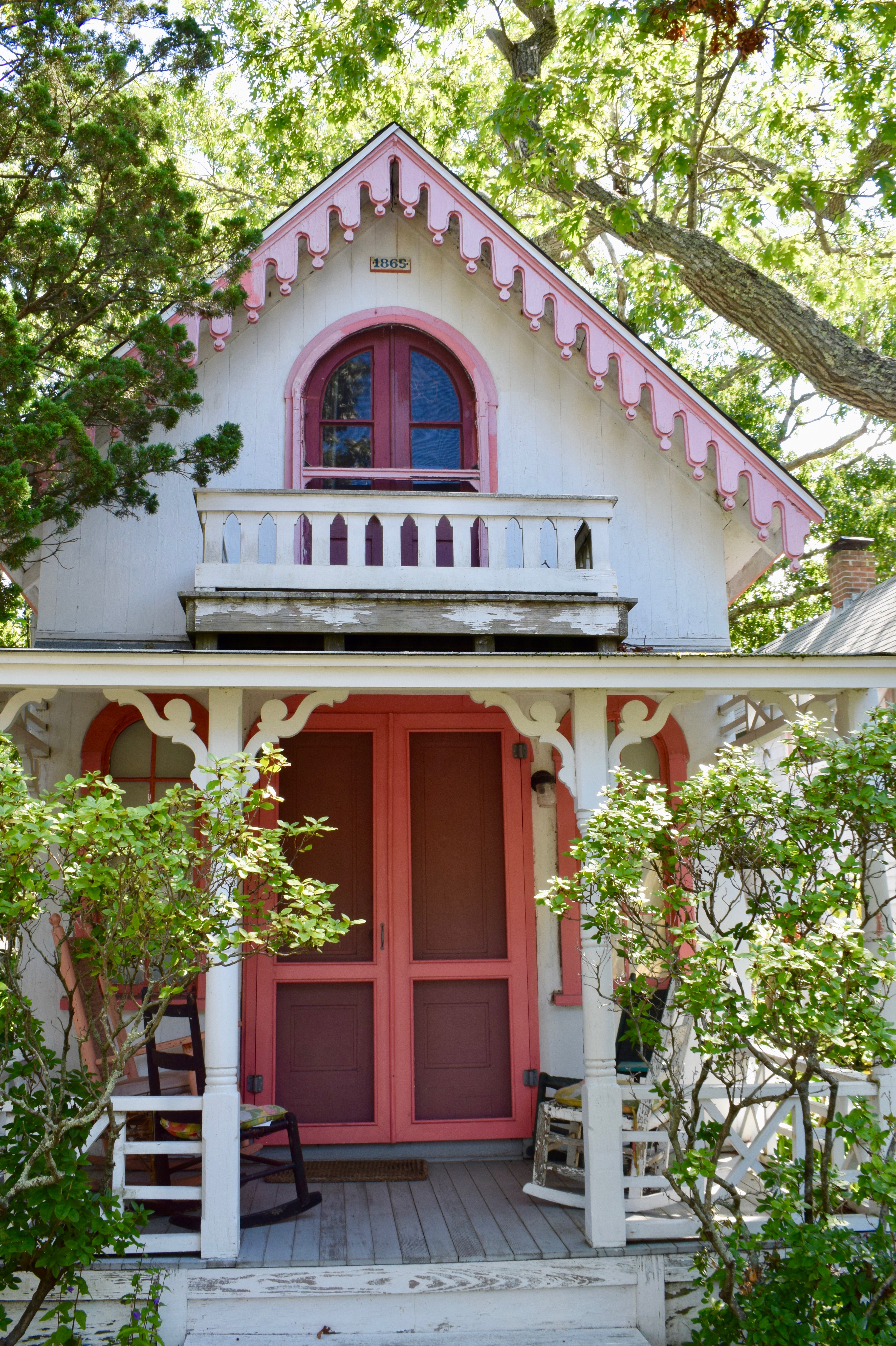 Weather-Worn Cottage with Pink Trim