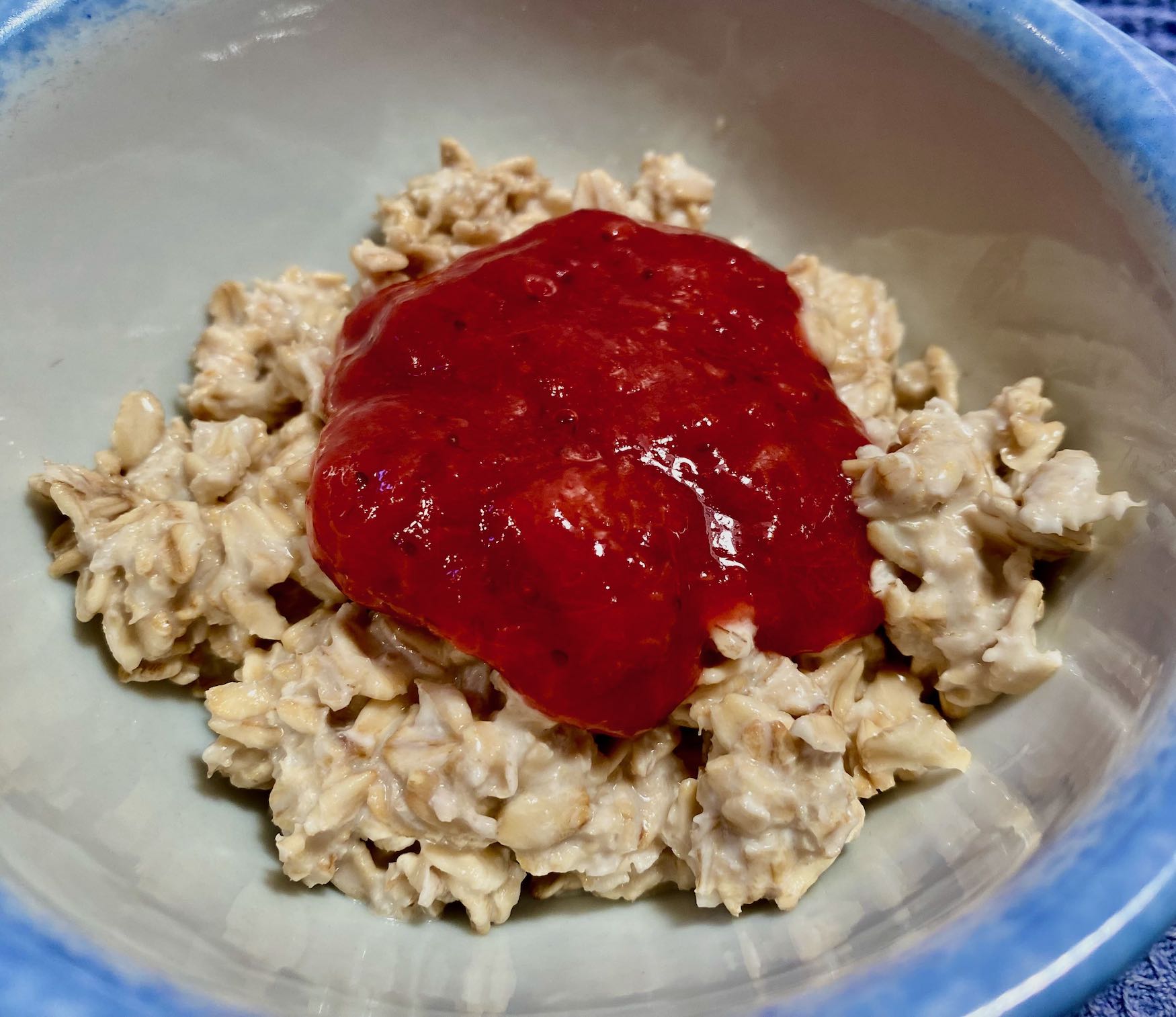 Bowl of Overnight Oats with Strawberry Rhubarb Compote