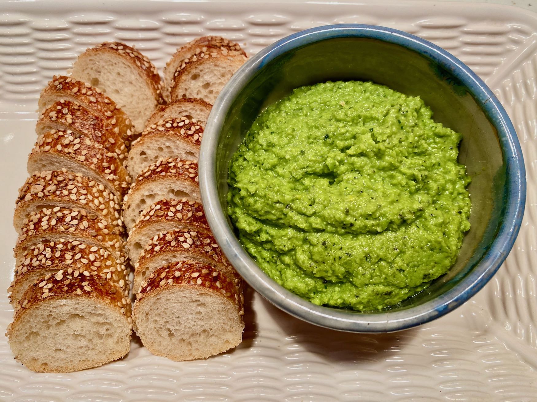 Baguette Slices and Pea Spread with Lemon, Garlic, and Mint