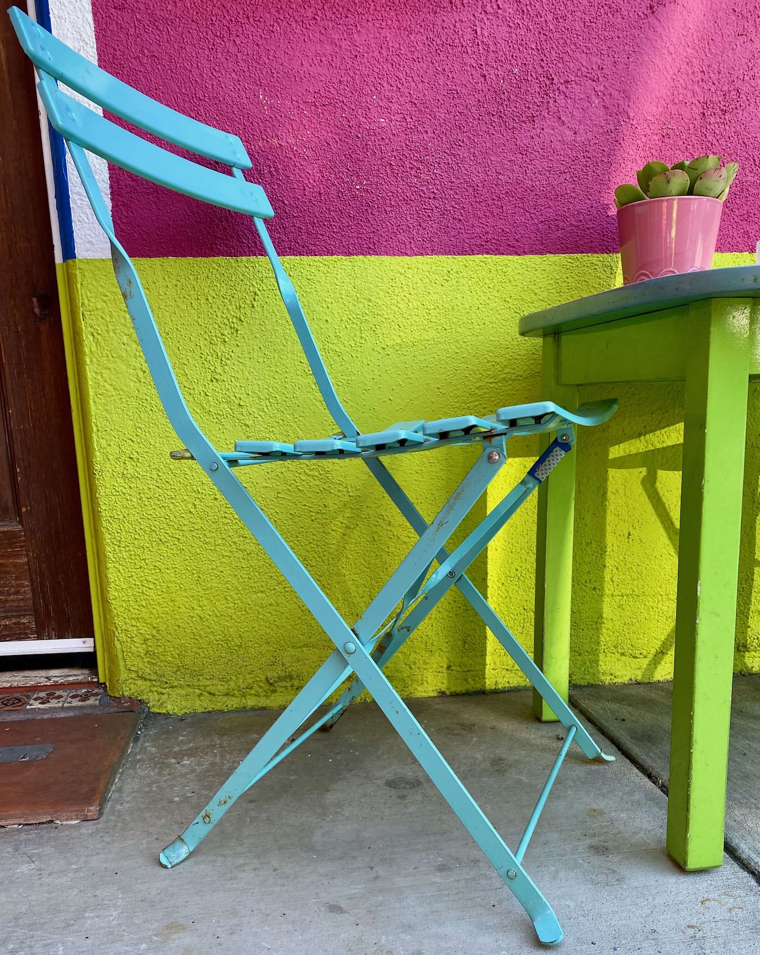 Robin's Egg Blue Chair with Pink and Chartreuse Walls