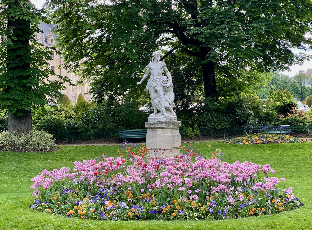 A Garden and Statue in a Paris Park