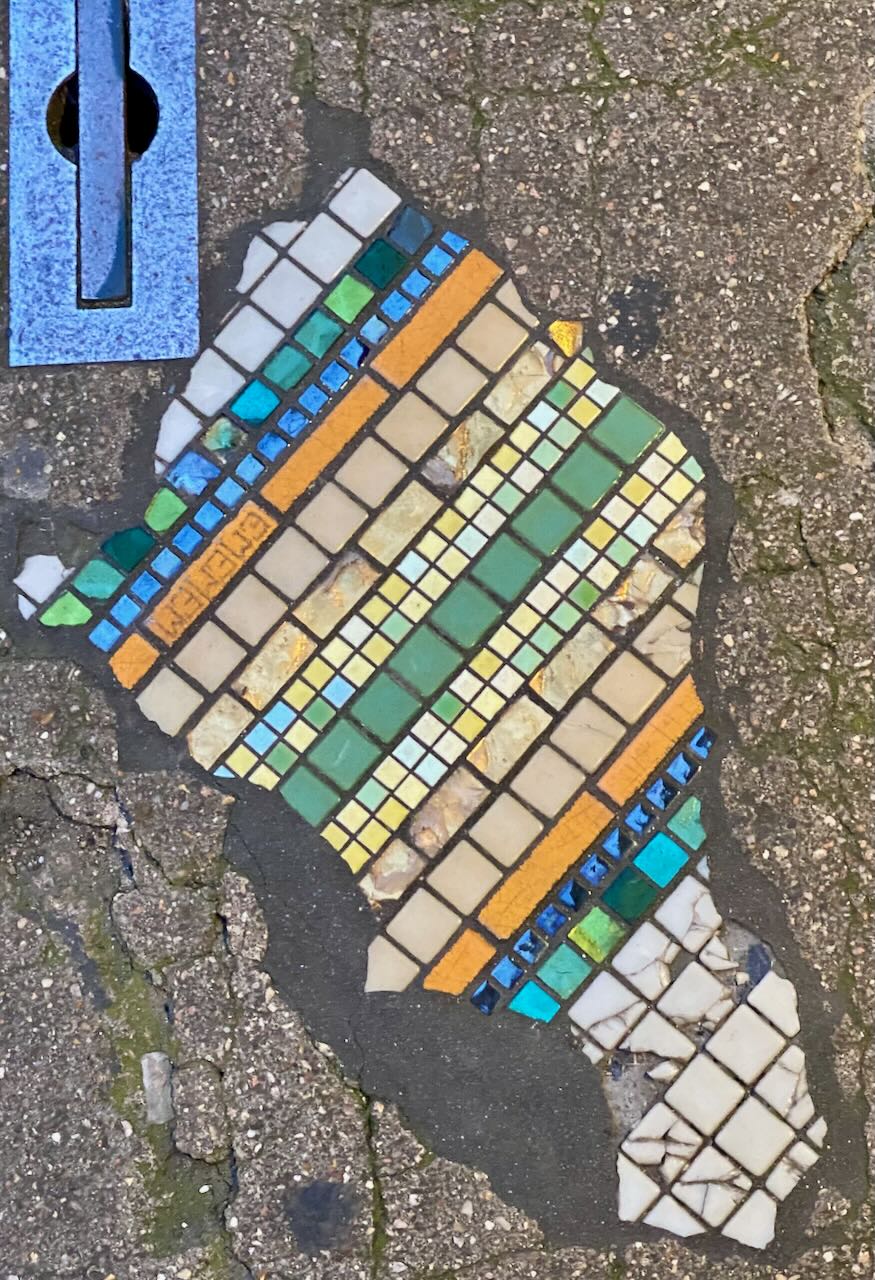 French Sidewalk Mosaic with Green, Yellow, and Blue Tiles