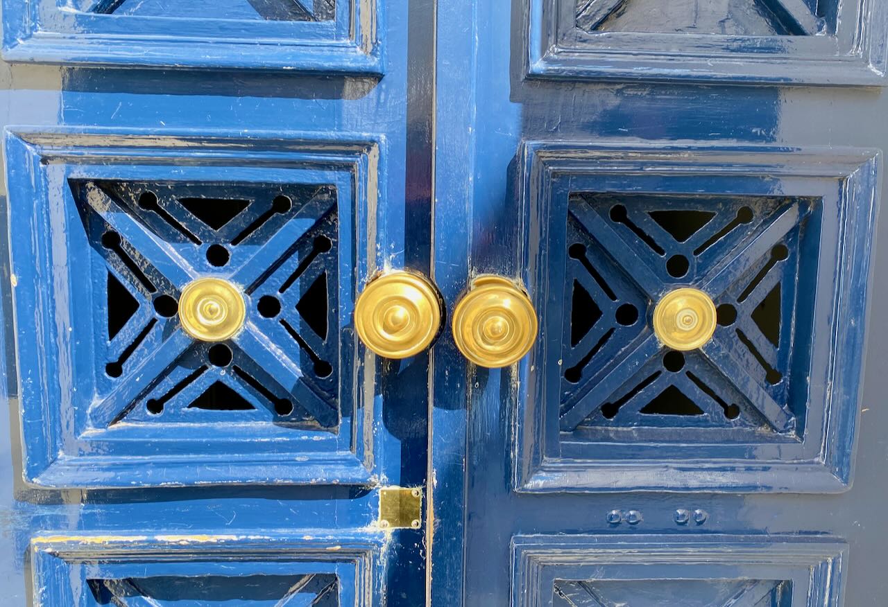 Parisian Blue Front Door with Gold Door Knobs