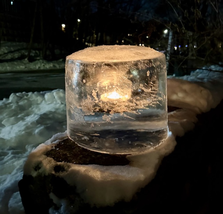 Candle Burning in Ice Candle Holder