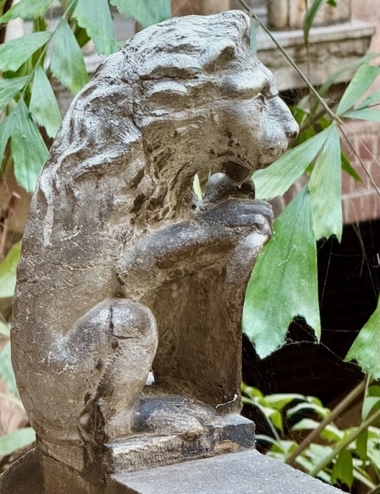 Lion Statue Overlooking Courtyard