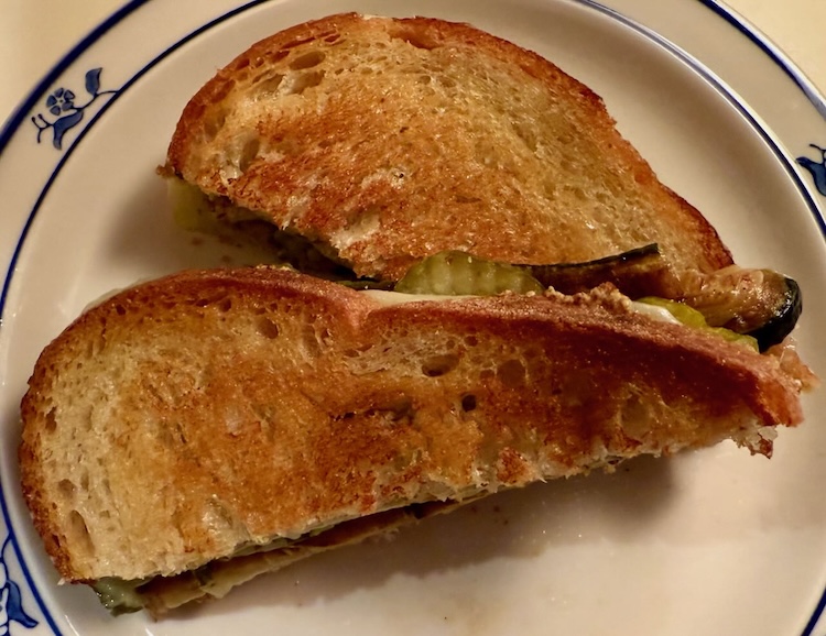 Sliced Veggie Cubano Sandwich on a Plate